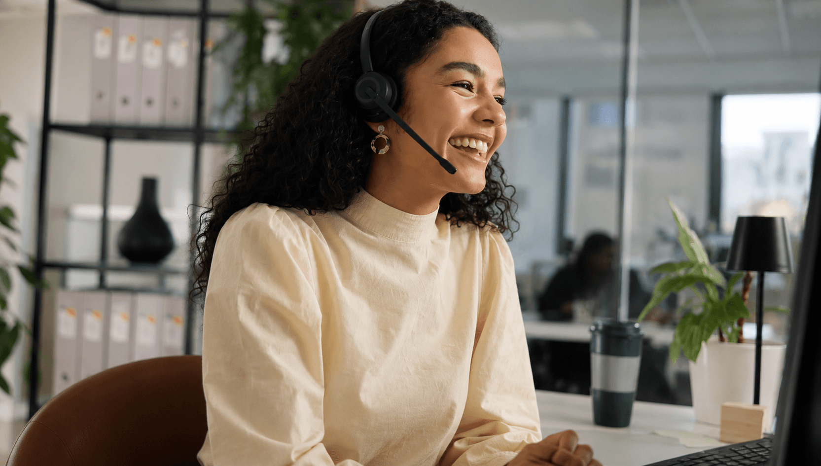 Professional using Sonovi AI phone intake with a headset